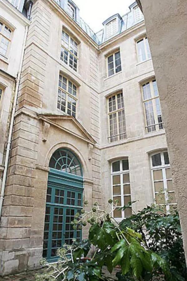 Apartamento Charming Cosy Triplex In Trendy Marais París Exterior foto