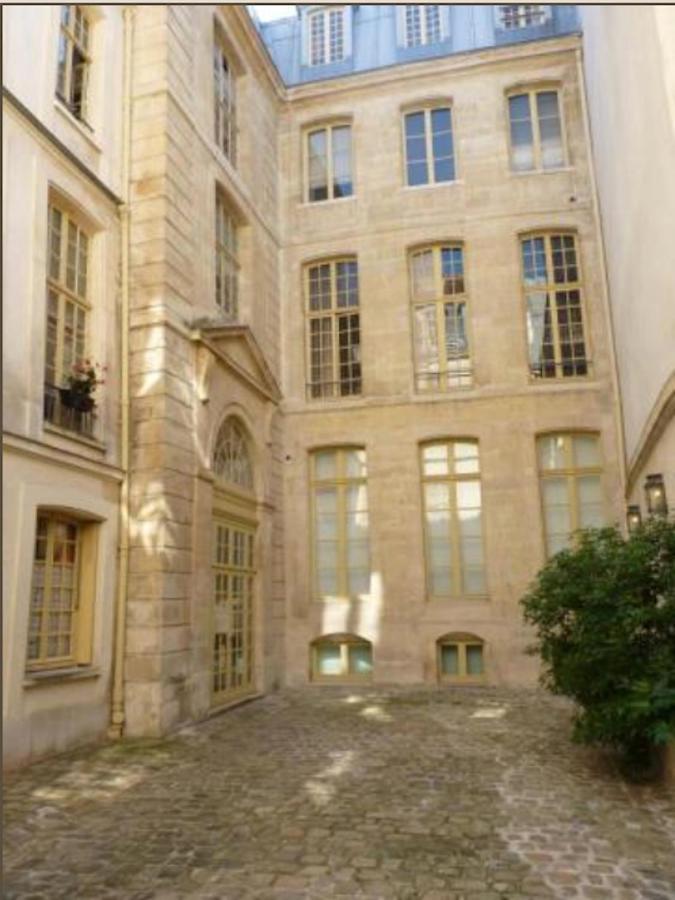 Apartamento Charming Cosy Triplex In Trendy Marais París Exterior foto